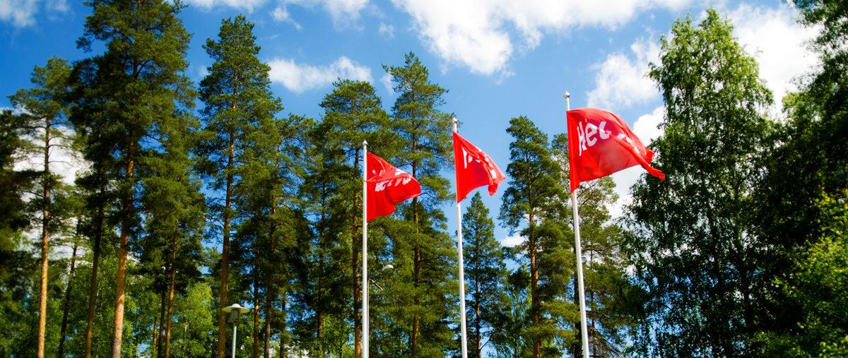 Helvar flags outside Karkkila factory during summer